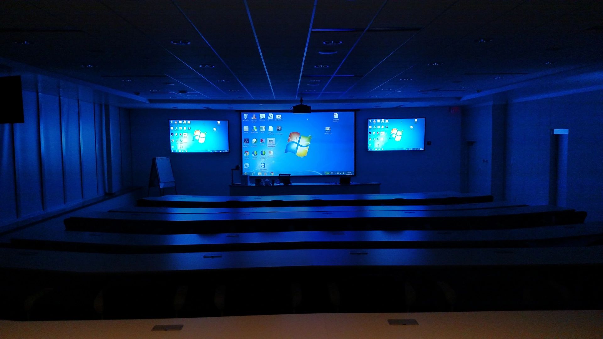 Conference room with multiple screens